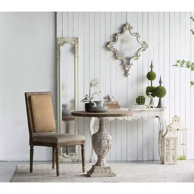 Specchio da parete ottagonale con cornice a volute