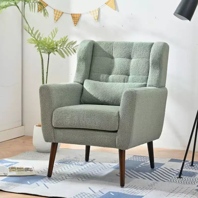 Poltroncina d'accento in ciniglia con cuscino decorativo e gambe affusolate in legno