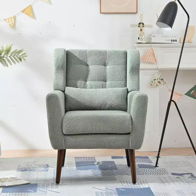 Poltroncina d'accento in ciniglia con cuscino decorativo e gambe affusolate in legno