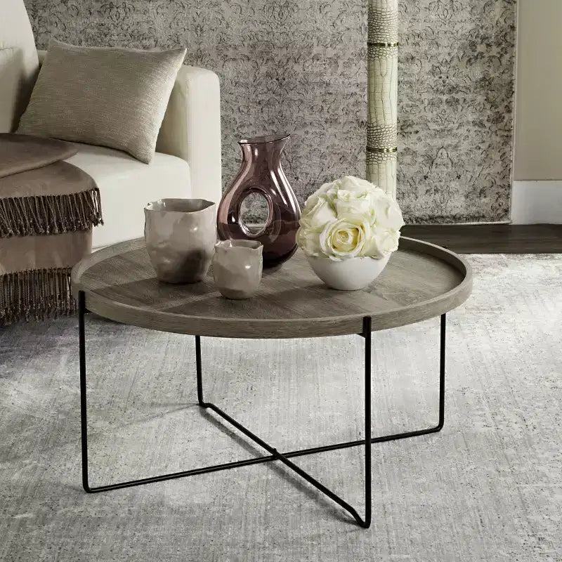 Tavolino rotondo d'accento – Piano beige con base in metallo nero